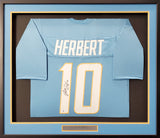 Los Angeles Chargers Justin Herbert Autographed Framed Powder Blue Jersey Beckett BAS Stock #191176