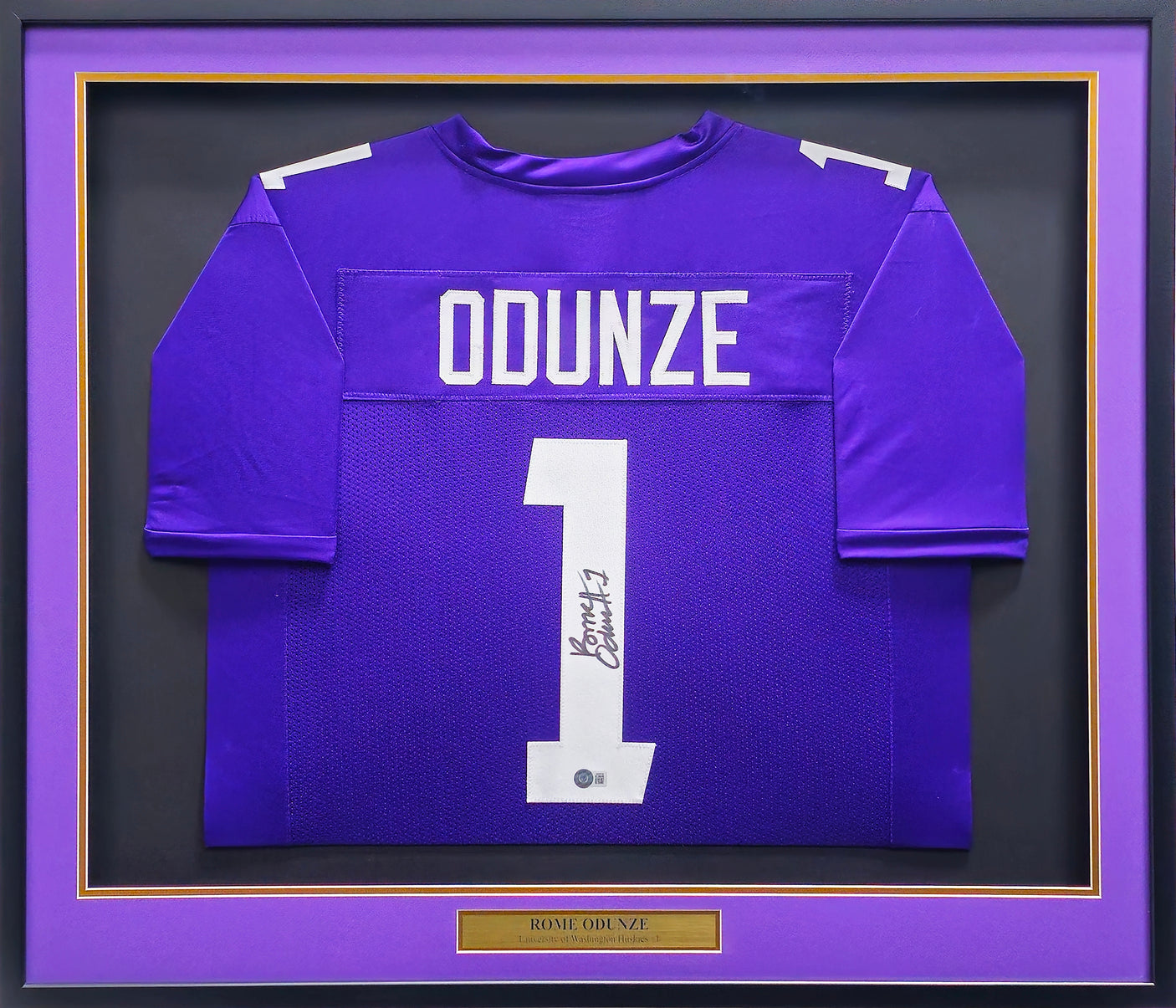 Washington Huskies Rome Odunze Autographed Framed Purple Jersey Beckett BAS Witness Stock #234602