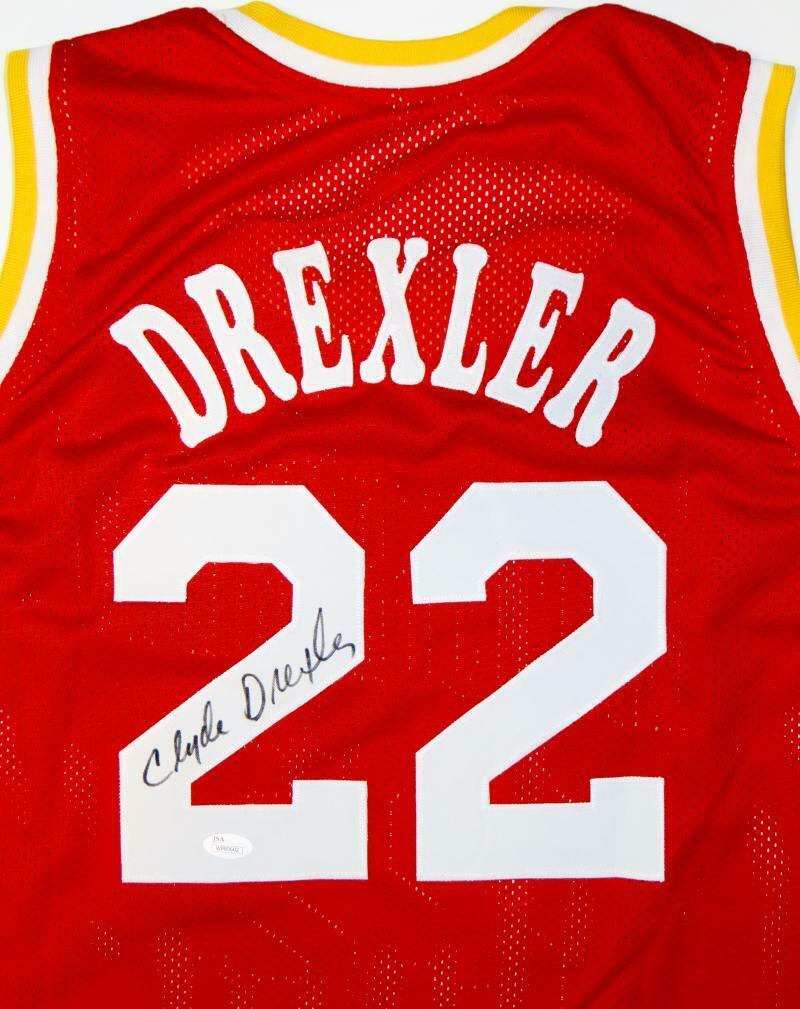 Clyde Drexler Autographed Red Jersey- JSA Witnessed Authenticated