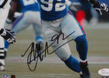 Michael Strahan Autographed NY Giants 8x10 Rushing PF Photo- JSA W Auth *Black