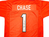 Cincinnati Bengals Ja'Marr Chase Autographed Orange Jersey Beckett BAS Witness Stock #226403