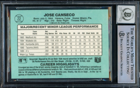 Jose Canseco Autographed 1986 Donruss The Rookies Rookie Card #22 Oakland A's Auto Grade Gem Mint 10 "86 AL ROY" Beckett BAS Stock #216704