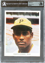 Pirates Roberto Clemente Signed 7x9 Team Issued Color Photo JSA & BAS Slabbed