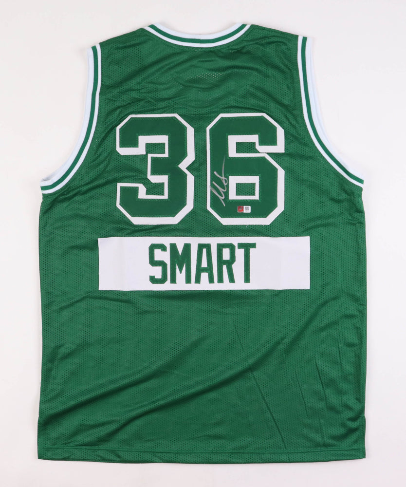 Signed XL jersey by Marcus Smart of the Boston Celtics with newest hologram!